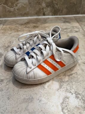 adidas Kids White Superstar Sneakers with Orange & Blue Stripes